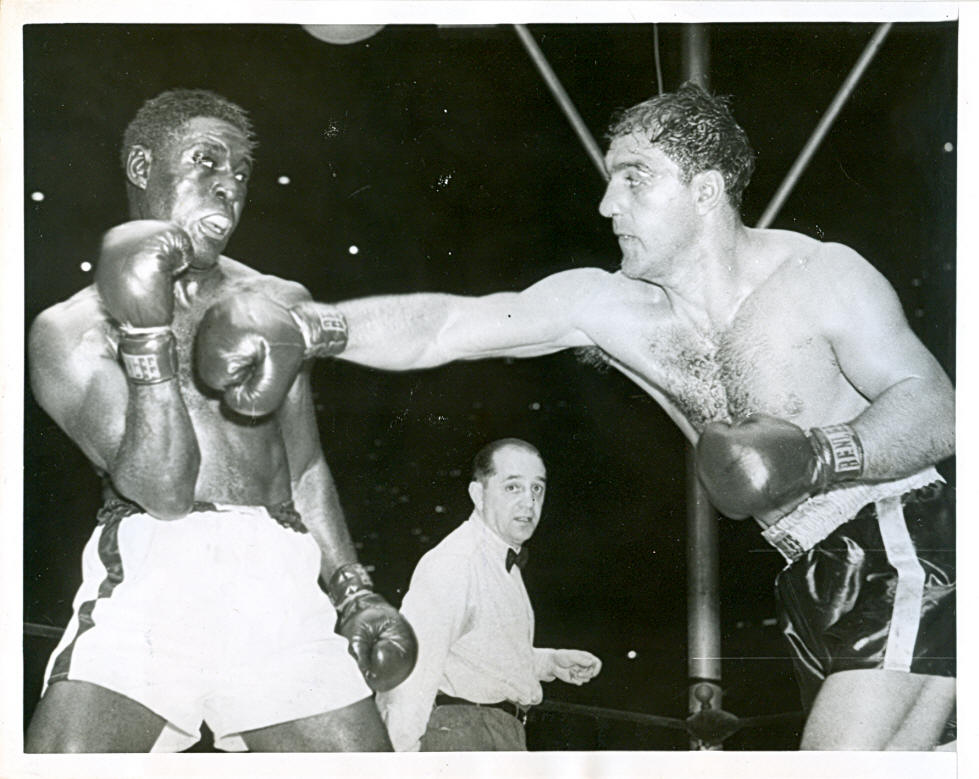 Rocky Marciano vs Ezzard Charles (1954). Regarded as one of the greatest heavyweight matches of