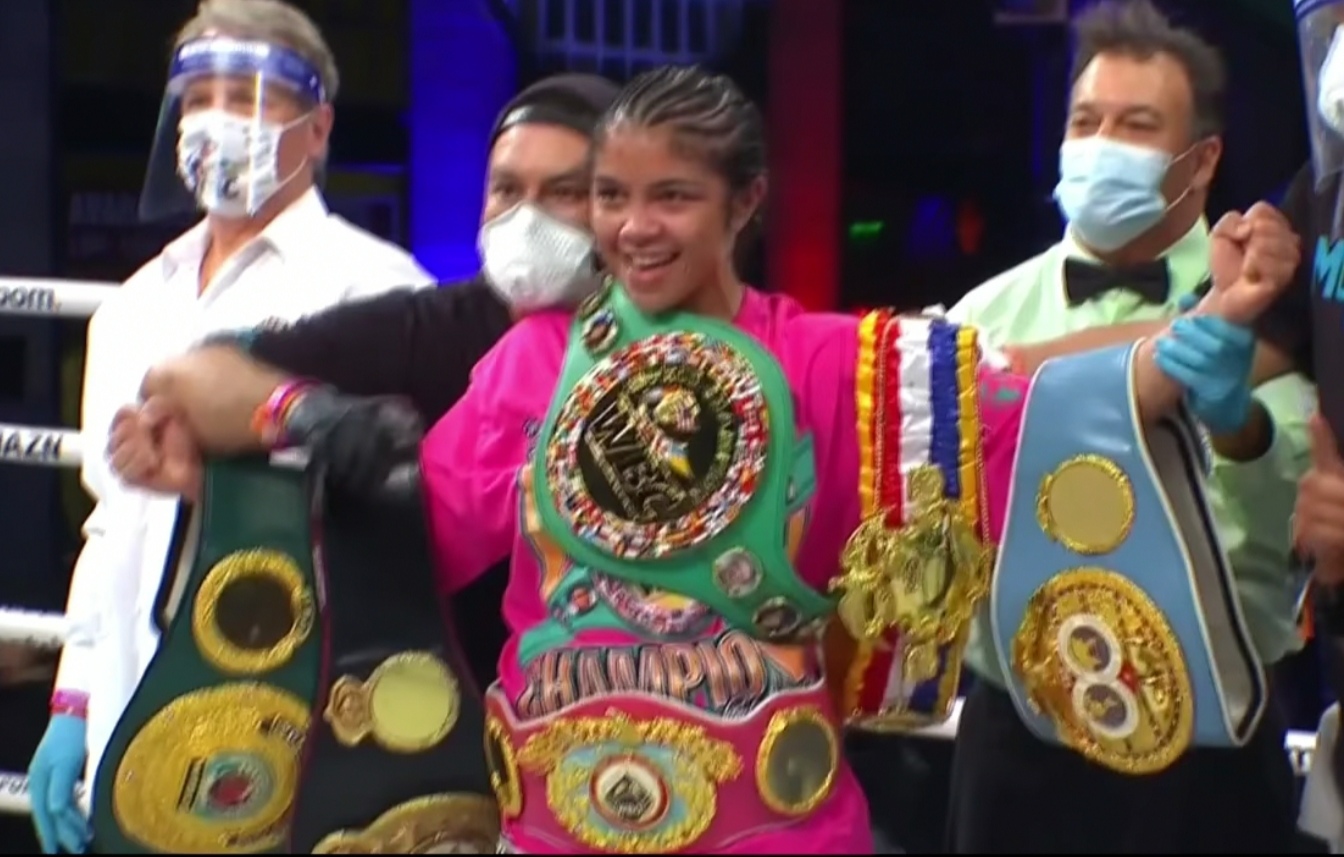 McCaskill with six welterweight belts.jpg