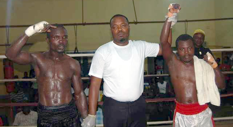 Isaac-Quaye-hands-raised.jpg