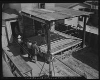 File:1940s Los angeles backyard gym.jpeg