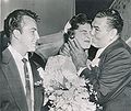 1954 Jack Dempsey Kisses Daughter Barbara.JPG