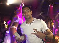 File:Amir Khan pole dancing girls dollars June 2012.jpg