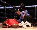 Carl-Davis-ko d-Gerald-Scott-counts-him-out.jpg