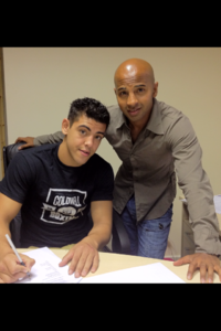 File:Chad gaynor signs with David Coldwell.png