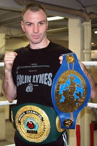 File:Colin Lynes with belts.jpg