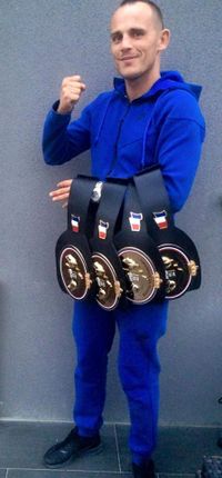 Damien Martinwbelts.JPG