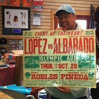 File:Frank Aragon and poster.jpg