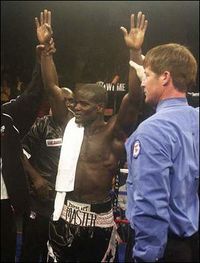 File:JOSHUA CLOTTEY HAND HELD UP BY REF MIKE ENGLAND.jpg
