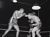 File:Joe Louis (R) vs Jimmy Bivins-1951.jpg