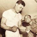 Joe louis and Henry Armstorng.jpg