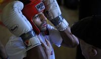 File:Kell Brook adjusts headguard 030310 courtesy Steve Parkin.jpg