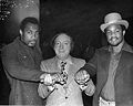 Ken Norton, and George Foreman with promoter Alex Valdez.jpg