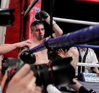 File:Kris Hughes knocked down by Frampton.jpg