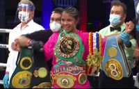 File:McCaskill with six welterweight belts.jpg