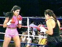 File:Mia St John vs. Linda Tenberg.jpg