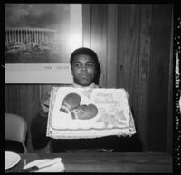 File:Muhammad Ali holds up a birthday cake.jpg