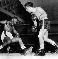 File:Nate Brooks getting ko by Rudy Garcia...1955.jpg