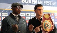 File:Ola Afolabi with Marco Huck press conference 030412.jpg