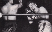 File:Ricardo Pajarito Moreno bombs Tommy Bain with a right..jpg