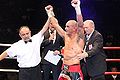 Soliman-Belted-referee-raises-victory-hands IBF.jpg