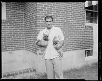 File:The Rock and his pooches.jpg