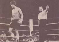 File:Tony Baltazar walks away after decking Howard Davis jR..jpg