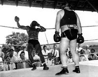 File:Tony Galento & unknown sparring partners .1938.jpg